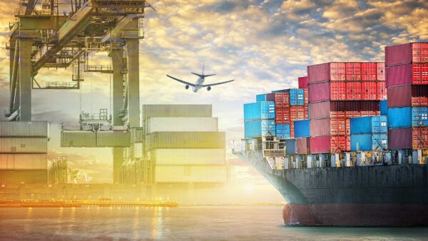 Container cargo ship and cargo plane with port crane bridge in harbor