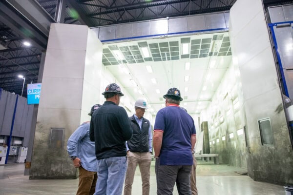 Senator John Thune discussing Maguire’s coating capabilities.