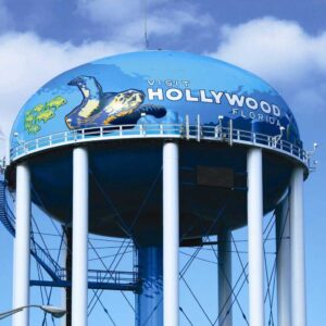 Multi-column steel water storage tank in Hollywood, Florida, with a custom sea turtle mural coating.