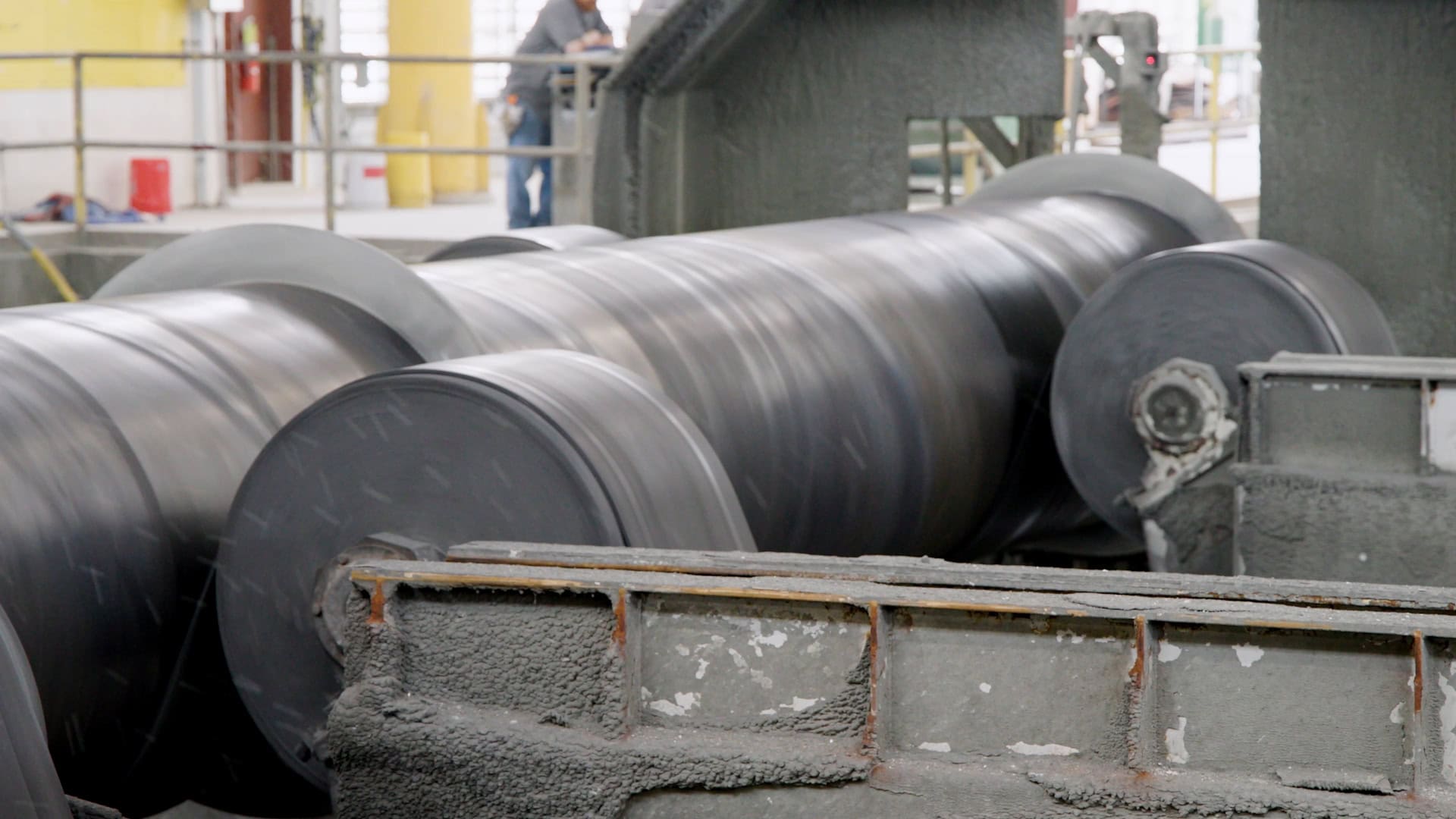 Cement-mortar lining being applied to steel water pipe