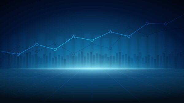 Blue digital bar chart with an upward-trending line graph representing growth.
