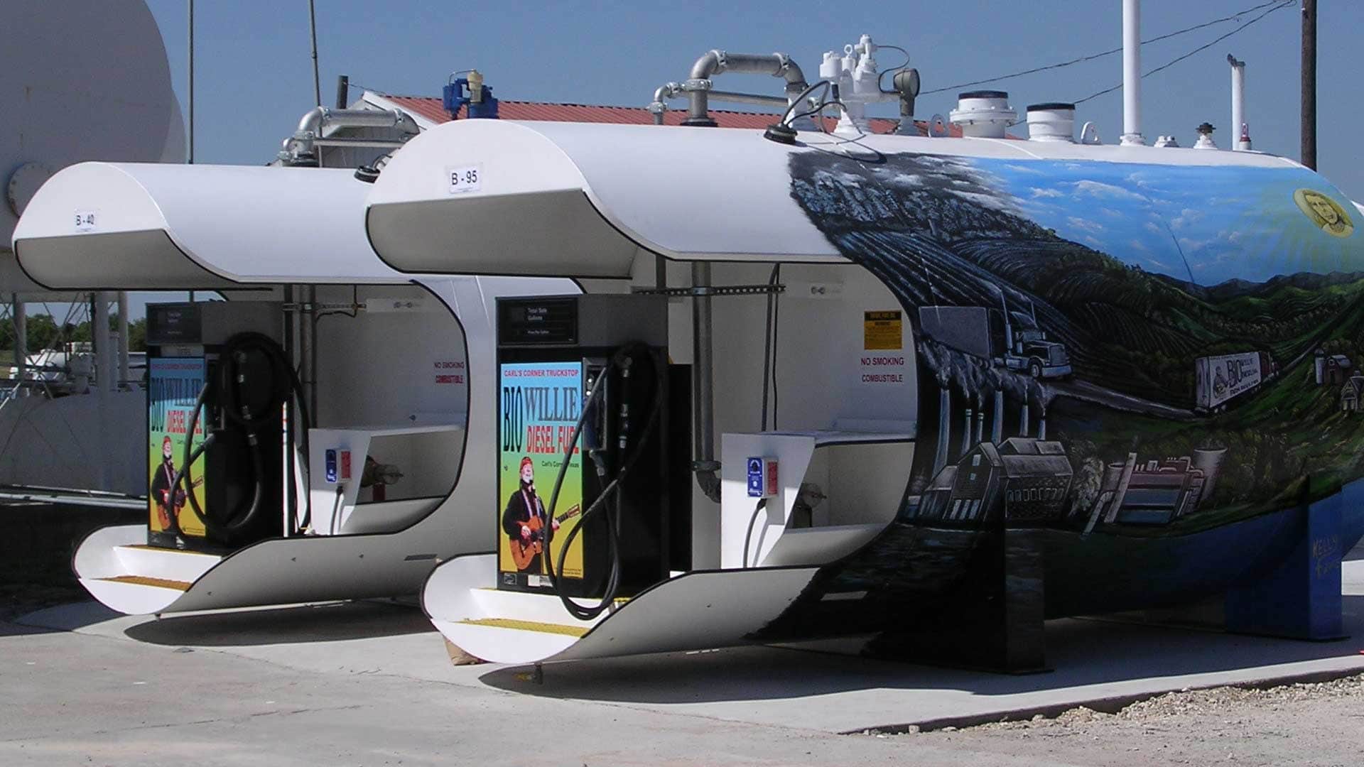 Aboveground steel fuel storage tanks with integrated dispensers at a biodiesel fueling station.